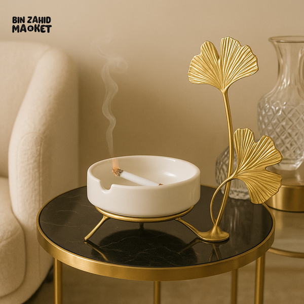 LUXURY VILLA SIDE TABLE DECOR – CERAMIC ASHTRAY WITH LIT CIGARETTE & GOLD GINKGO LEAF ORNAMENT